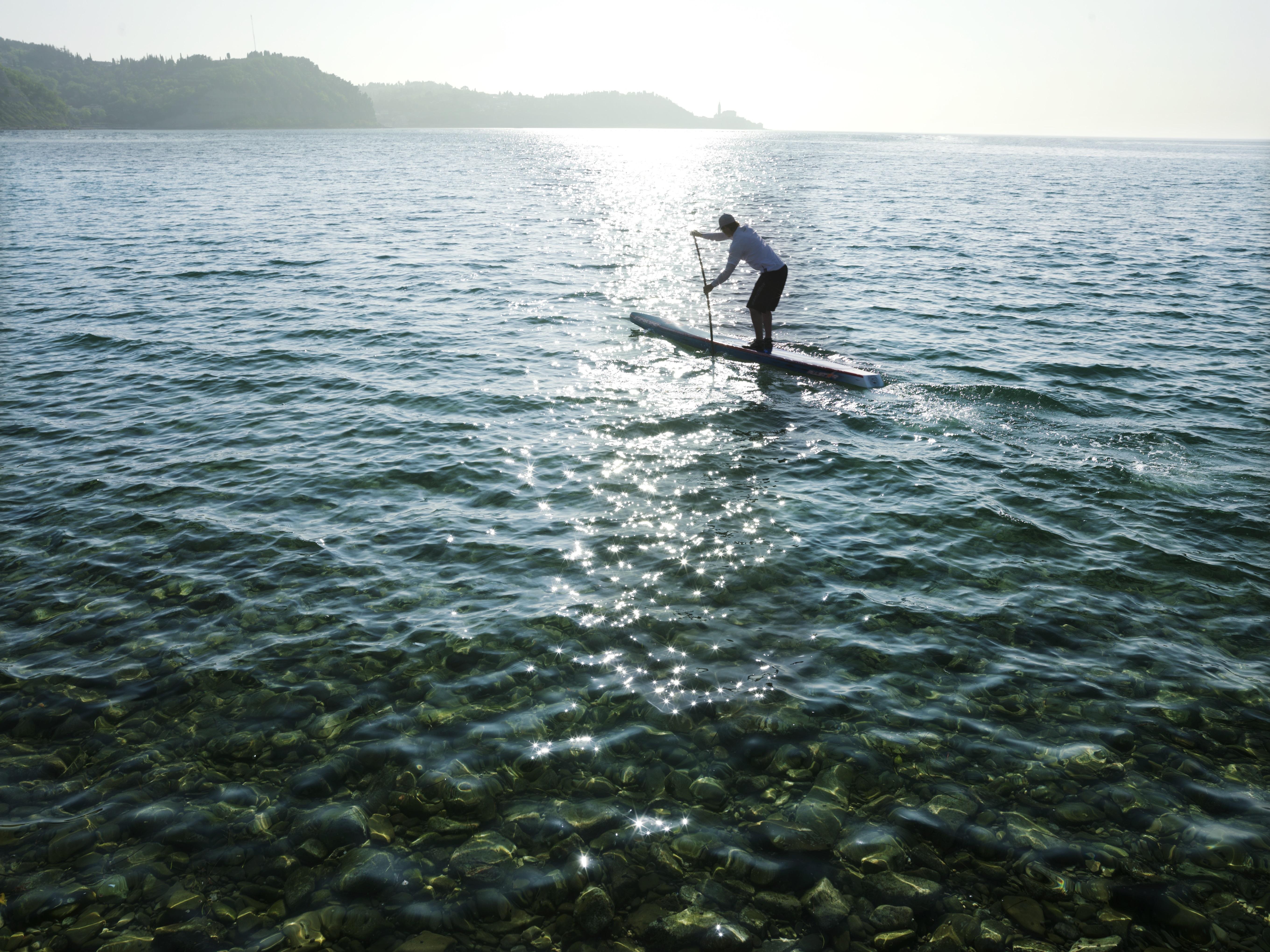 Hotel Slovenija - Terme & Wellness Lifeclass Portorose Esterno foto Stand-up paddle boarder on Lake Balaton
